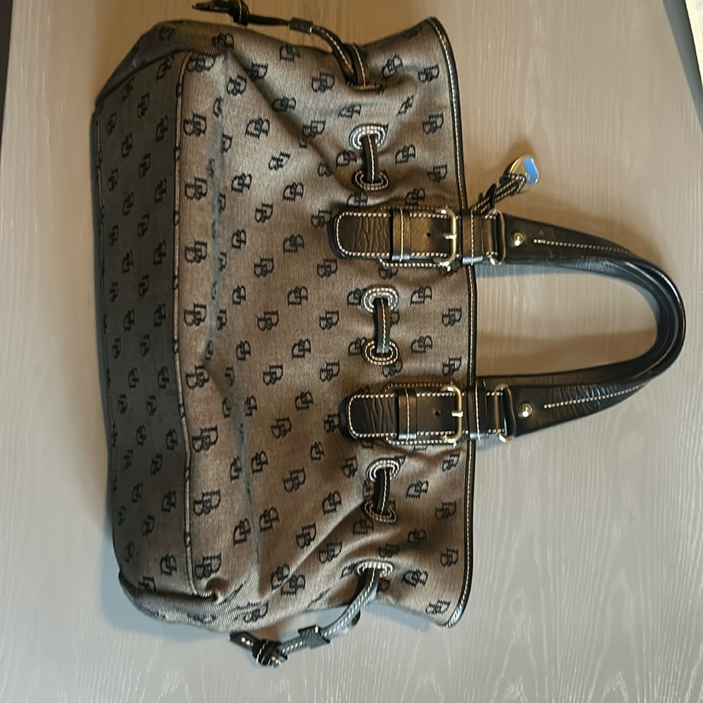 Black and gray Dooney & Bourke canvas with leather shoulder tote.